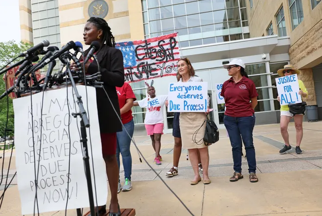 Ama Frimpong, a lawyer in the Kilmar Abrego Garcia wrongful deportation case, speaks to reporters.